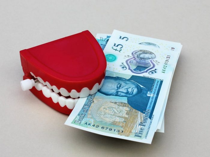money and teeth