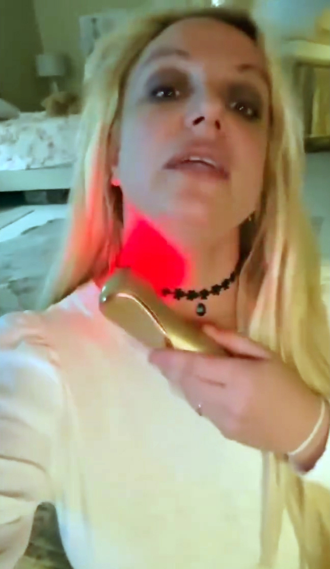 Britney used a red light therapy device and a sculpting wand on her face and neck