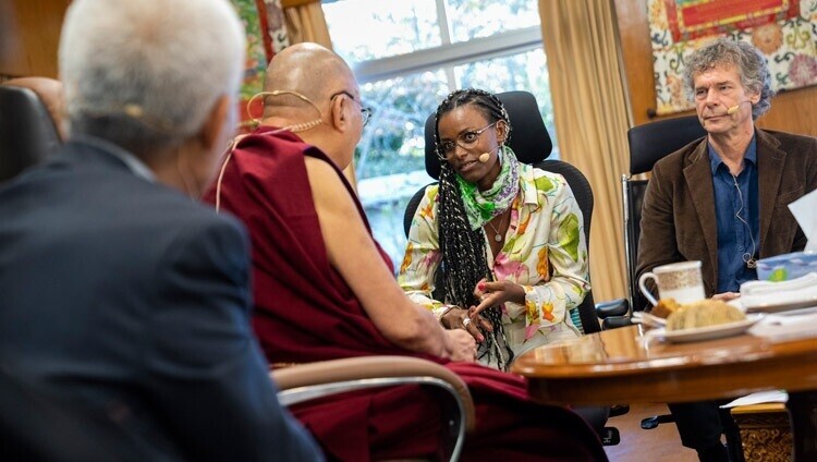 Abeba Birhane presents on the topic of AI and Big Tech accountability at a talk hosted by the Dalai Lama on Oct. 13, 2022, on interdependence, ethics and social networks. (from the Dalai Lama’s website)