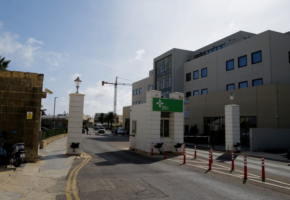 The entrance to Gozo General Hospital as seen on May 29, 2024. The sign was changed from Steward's signature royal blue to green after a watershed court ruling struck down its contract to run the hospital, calling the arrangement â€œfraudulent.â€ 