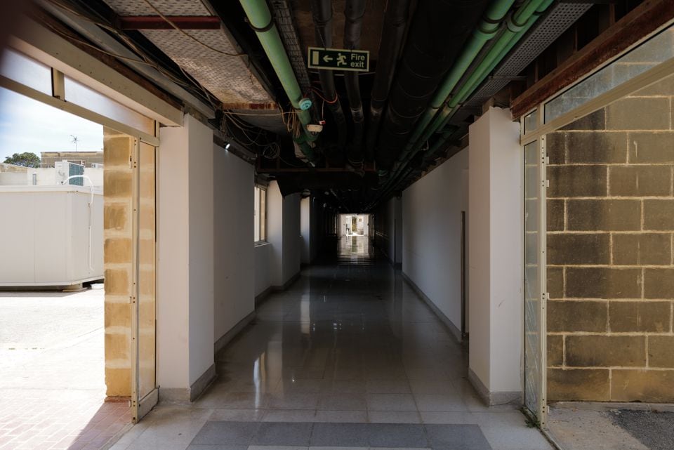 A hallway off the main wing of Gozo General Hospital as seen on May 29, 2024. The hospital was one of three Steward Health Care was supposed to renovate and manage as part of a 4 billion euro hospital deal with the government of Malta. 