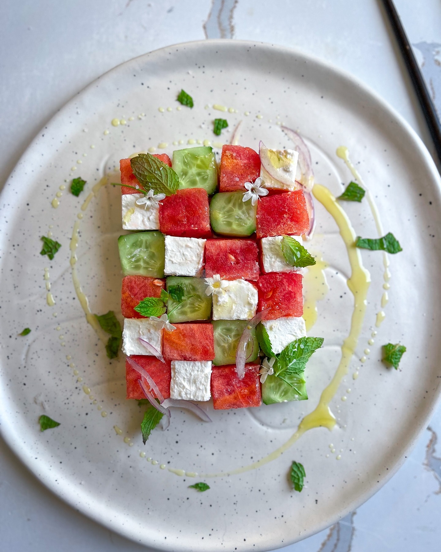 Cubed watermelon with cucumber and feta cheese salad(Instagram)