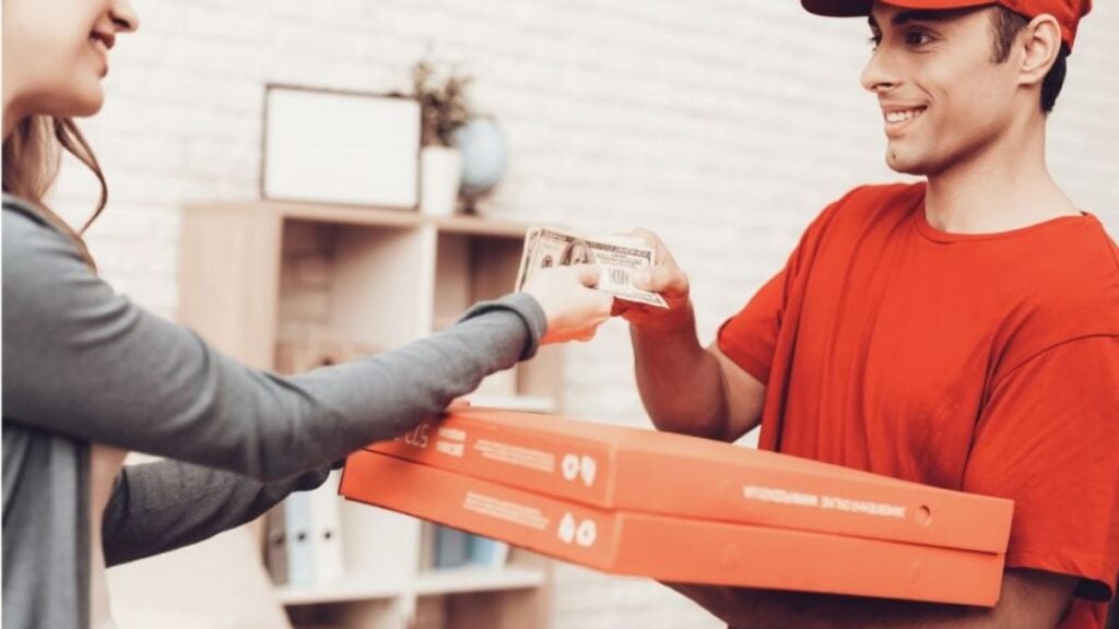 Best Pizza Delivery Deals; Man Delivering Pizza