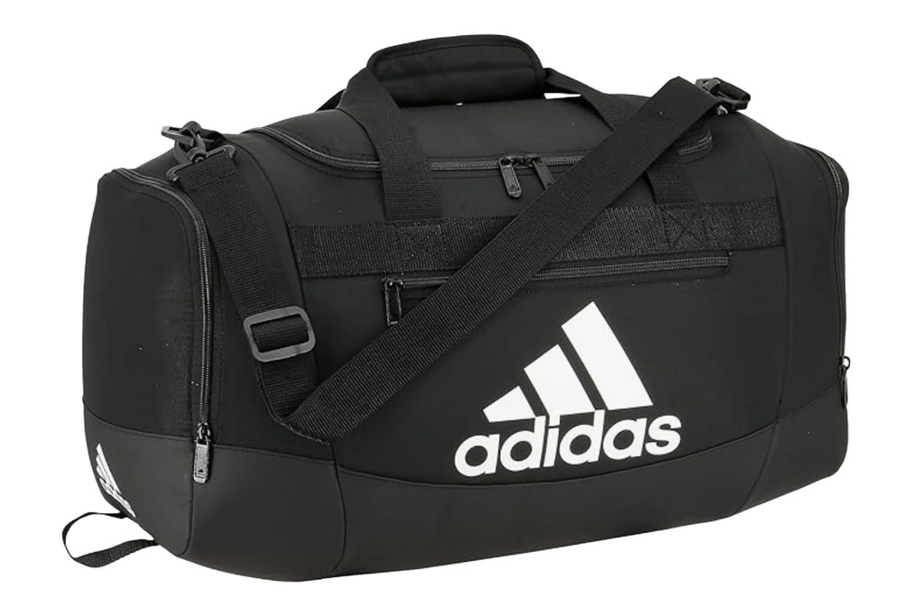 A black duffel bag with white Adidas logo.