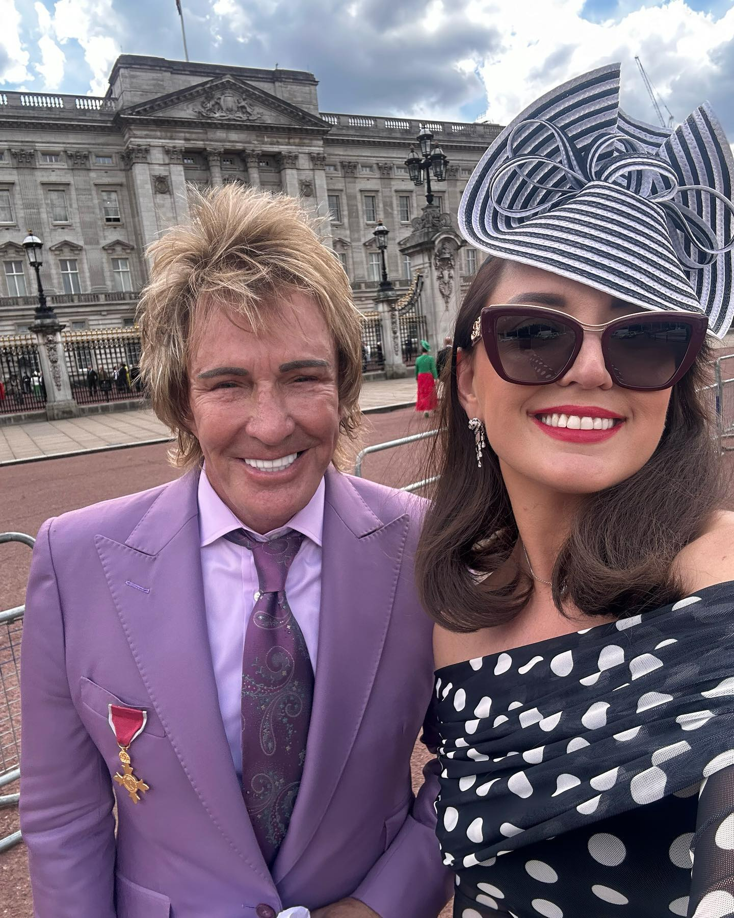 Charlie with fiance 'RaRa' at the Royal Garden Party at Buckingham Palace