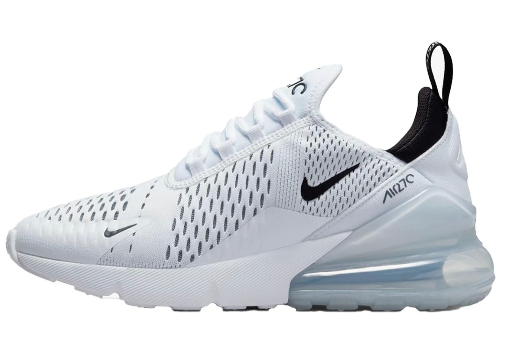 A white and black Nike tennis shoe.