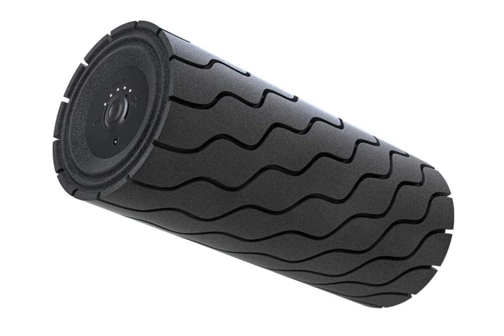 Black cylindrical roller with a circular attachment.