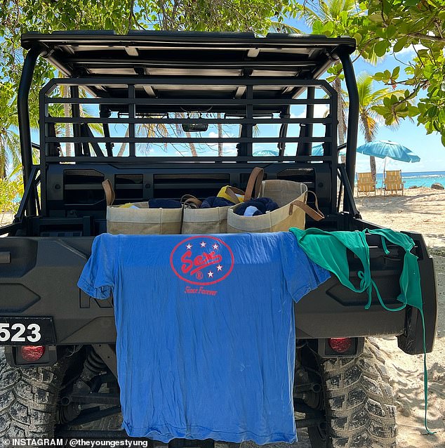 She also shared a snap of a 'Sex' T-shirt and her green bikini laid out on the back of a dune buggy on the beach