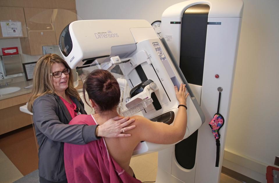 Katherine Esdale, a breast imaging technologist at the Helen F. Graham Center, conducts a 3-D mammogram using a tomosynthesis machine made by Hologic. The machine's core technology is made at Hologic's plant near Glasgow.
Katherine Esdale, a breast imaging technologist at the Helen F. Graham Center, conducts a 3-D mammogram in February using a tomosynthesis machine made by Hologic. The machine's core technology is made at Hologic's plant near Glasgow, Del.