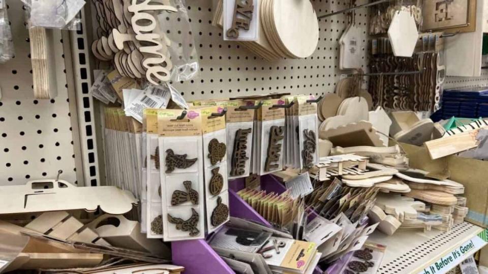 Wooden craft supplies on store display at a dollar store