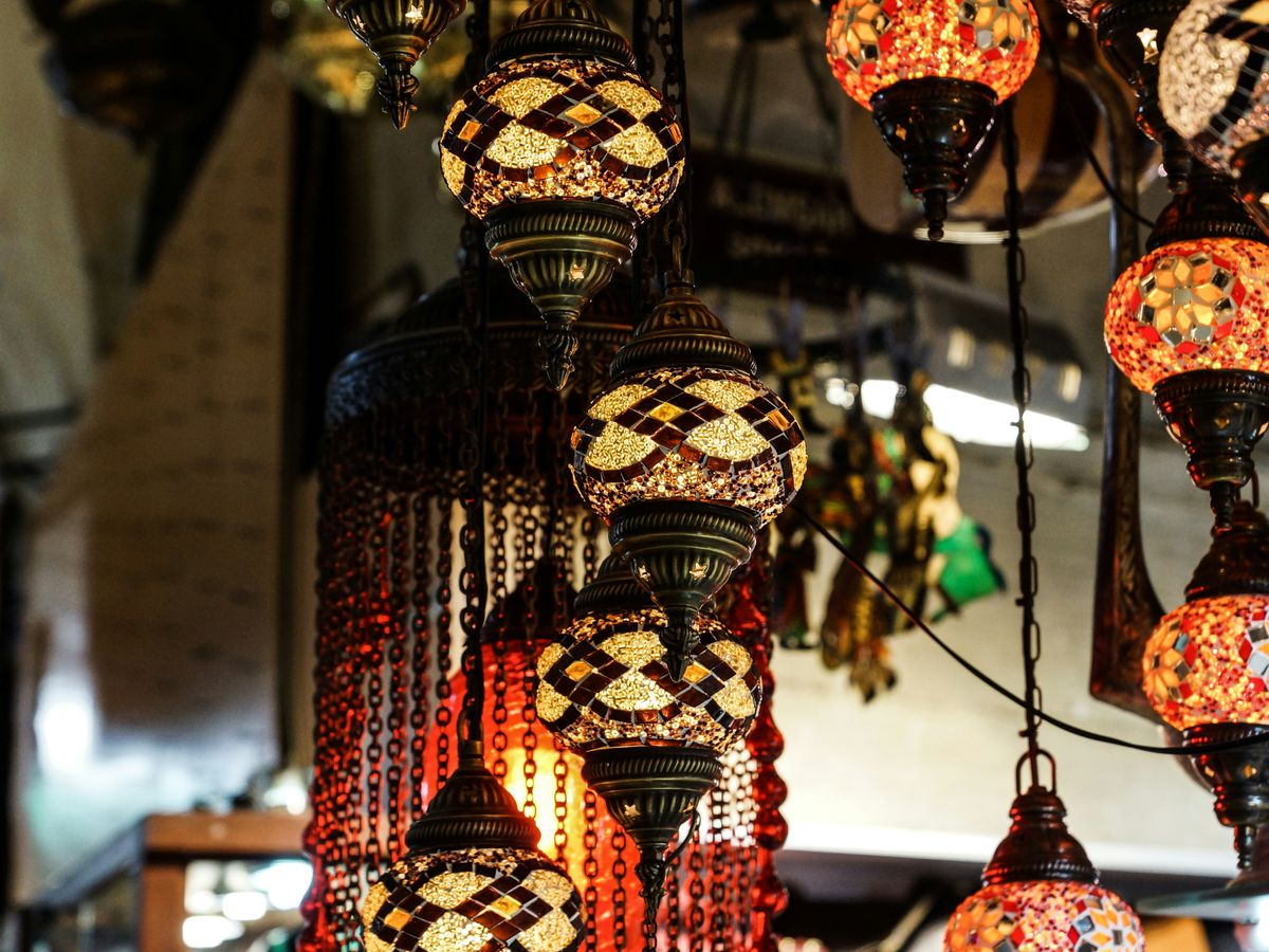 red, brown, and white downlight chandelier