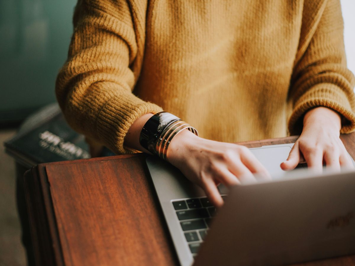 person using laptop computer