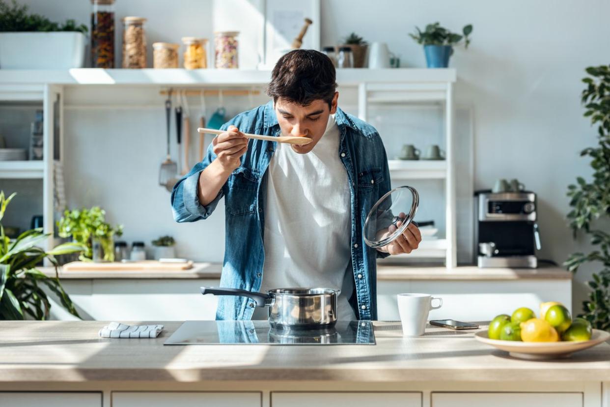 man tasting the food