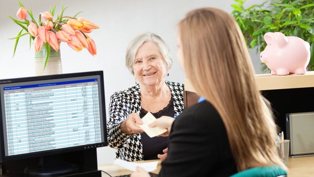 Investing In Savings Bonds; Bank Customer with Bank Teller