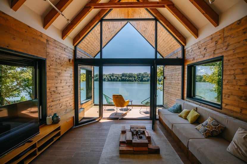 Lake house with a view of the water