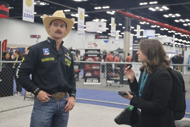 U.S. Army Outdoors team member and bareback bronc rider, Spec. Ethan Crouch, speaks with an iHeart reporter during the National Future Farmers of America convention in Indianapolis, Indiana Oct. 23-25 2024.