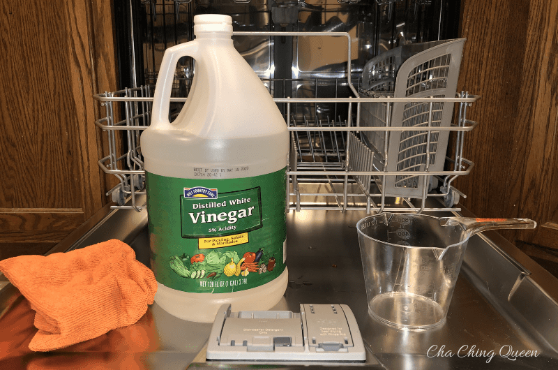 How to Clean Your Dishwasher with Vinegar - rag, vinegar, cup