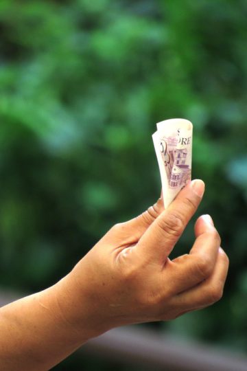 Your Feelings About How Much Money You Make May Affect Your Happiness More Than The Actual Number
